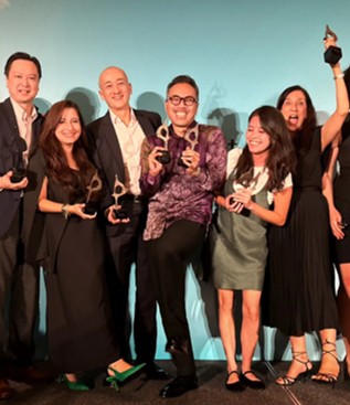 Celebrating a win at the SABRE Awards
